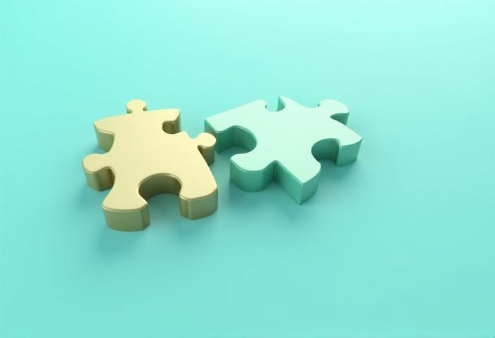 Puzzle pieces coming together representing talent acquisition strategy